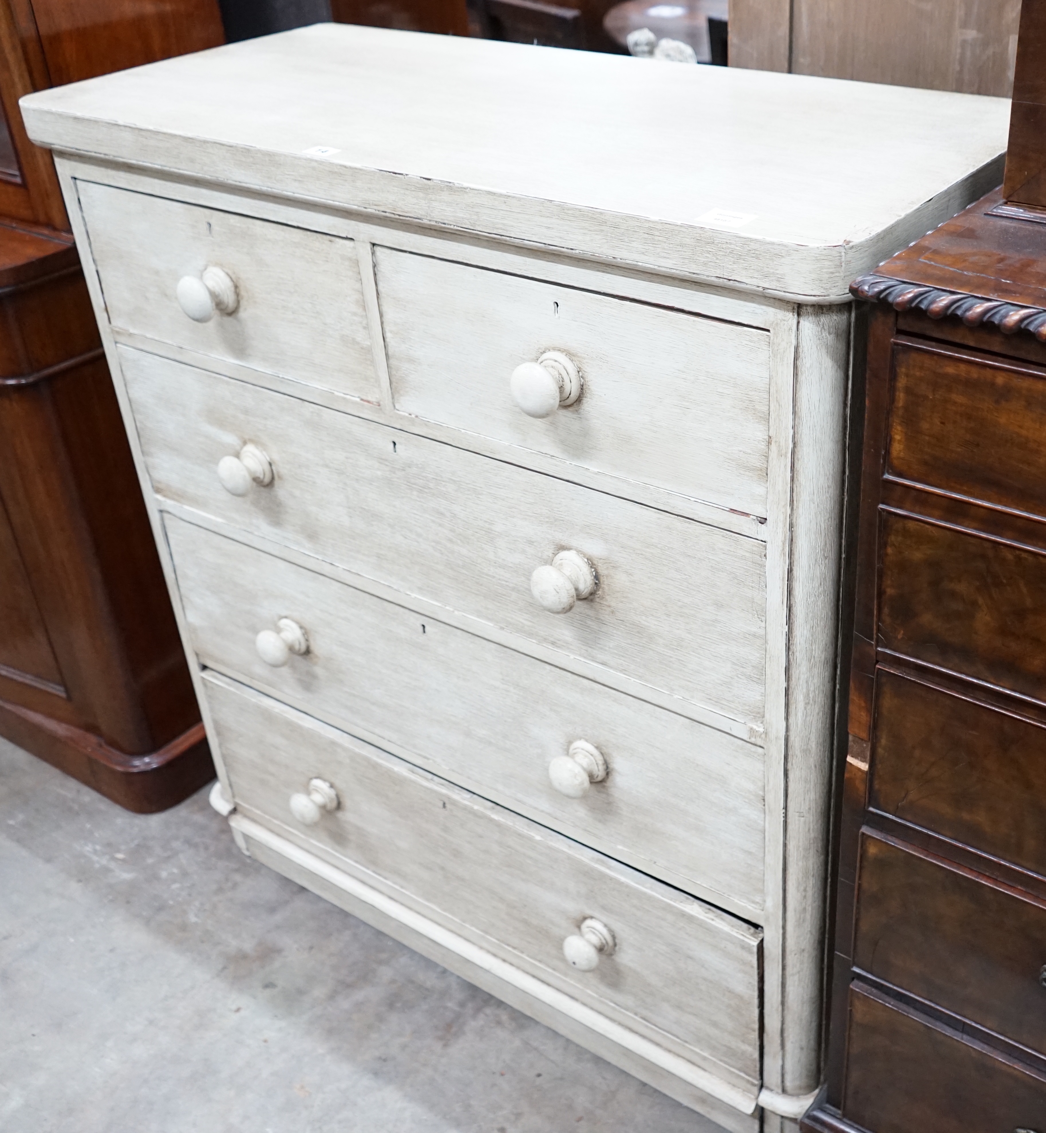 A Victorian later painted chest of two short and three long drawers, width 102cm depth 48cm height 111cm